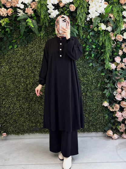 “ستايل شتوي راقي – إنسومبل دافئ يدفّيك ويزيد أناقتك”